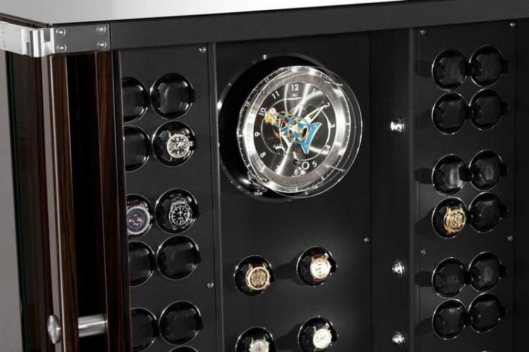 Buben-Zorweg SOLITAIRE ORBIT TOURBILLON. Включает сейф, подзавод часов, часы, хьюмидор, Hifi система и бар. 